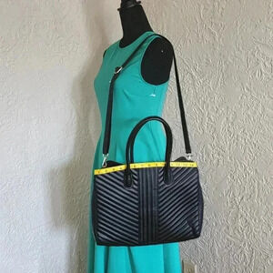 A new day tm.large bag great for laptop 💻 like new use only at few times.